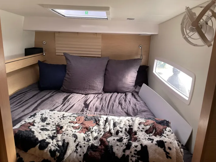 Inconceivable Yacht Photos Pics Cozy cabin interior of 2018 Outremer 4X with plush bedding and natural light.