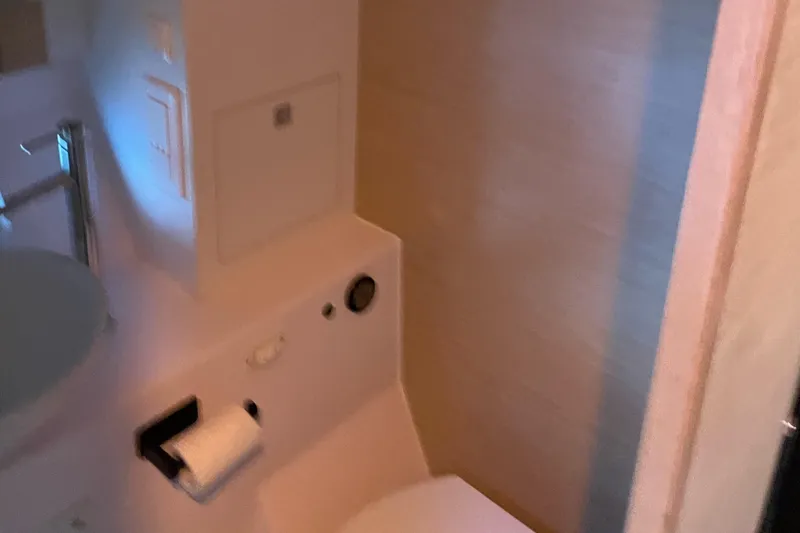 Inconceivable Yacht Photos Pics Bathroom interior of 2018 Outremer 4X yacht, featuring modern fixtures and compact design.