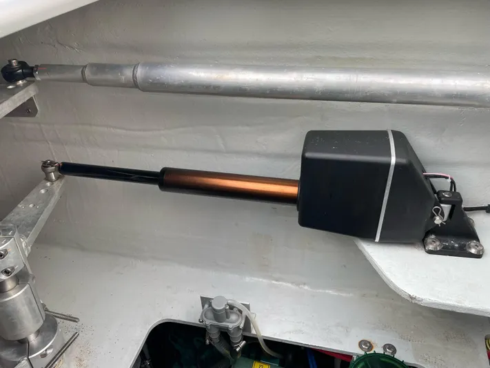 Inconceivable Yacht Photos Pics Hydraulic system in 2018 Outremer 4X yacht, featuring metal components and a black housing.