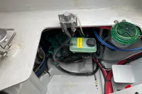 Engine compartment of a 2018 Outremer 4X catamaran with visible wiring and components.