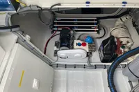 Engine compartment of 2018 Outremer 4X, featuring mechanical components and wiring.