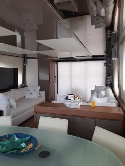  Yacht Photos Pics Luxurious 2020 Intermarine 80 yacht interior with modern seating and dining area.