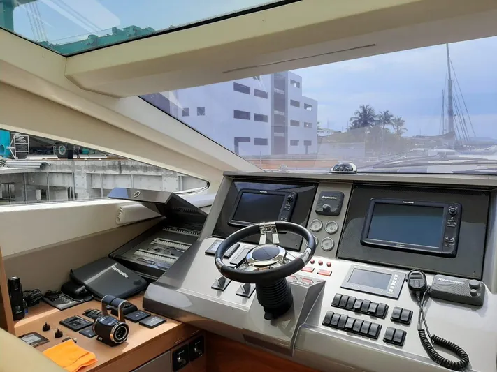  Yacht Photos Pics Cockpit of 2020 Intermarine 80 yacht with modern navigation equipment and controls.