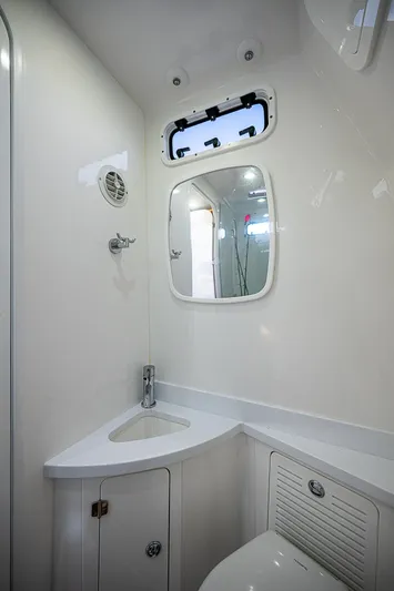  Yacht Photos Pics 2022 HCB 53 yacht bathroom with modern fixtures and compact design.