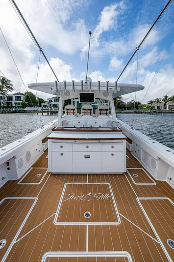  Yacht Photos Pics 2022 HCB 53 yacht with spacious deck and luxurious seating on a sunny day.