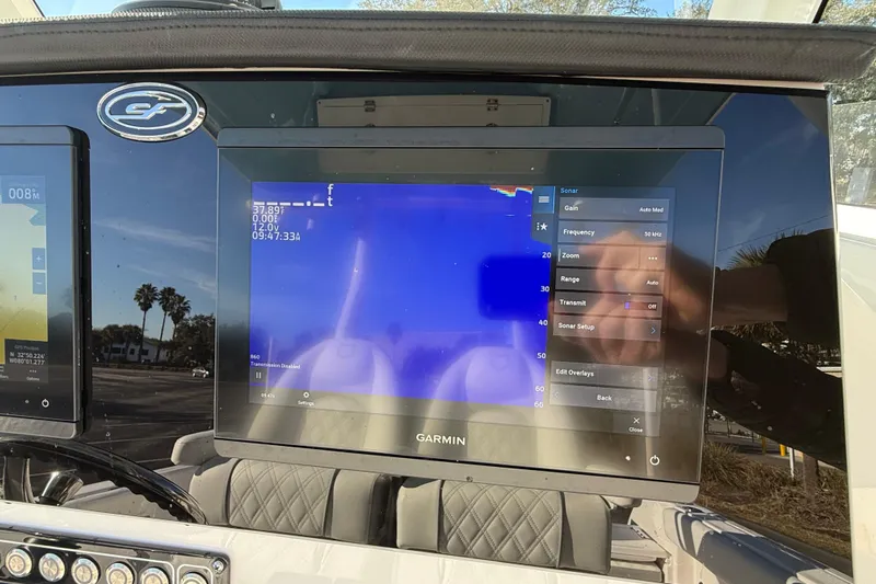  Yacht Photos Pics 2024 Sea Fox 288 Commander dashboard with Garmin sonar display and control settings.