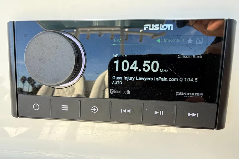  Yacht Photos Pics Fusion marine stereo on 2024 Sea Fox 288 Commander, tuned to 104.5 MHz classic rock station.