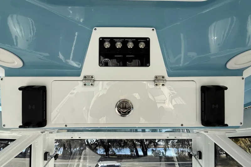  Yacht Photos Pics 2024 Sea Fox 288 Commander boat dashboard with control panel and storage compartment.