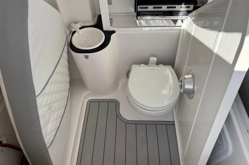  Yacht Photos Pics 2024 Sea Fox 288 Commander boat bathroom with toilet and sink.