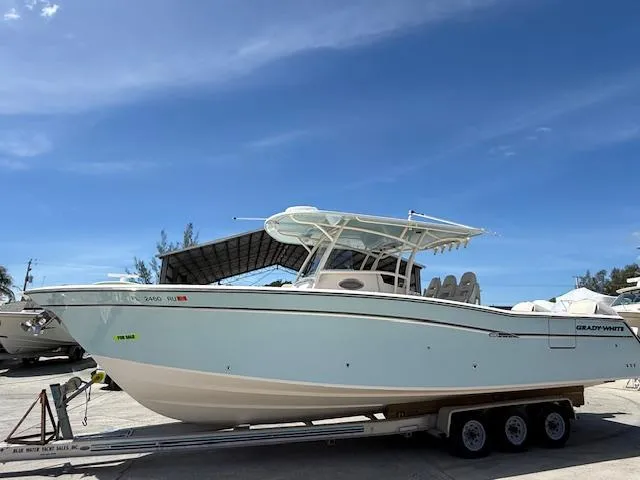 336-311 Brokerage Ron Yacht Photos Pics 2018 Grady-White Canyon 336 boat on trailer under clear blue sky.