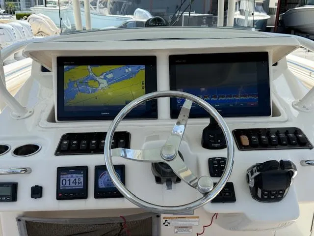 336-311 Brokerage Ron Yacht Photos Pics 2018 Grady-White Canyon 336 helm with dual navigation screens and controls.