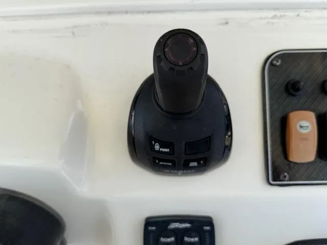 336-311 Brokerage Ron Yacht Photos Pics Control panel of 2018 Grady-White Canyon 336 boat with joystick and switches.