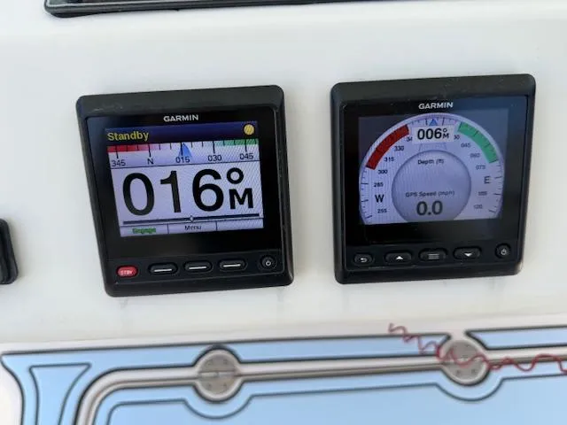 336-311 Brokerage Ron Yacht Photos Pics Garmin navigation displays on a 2018 Grady-White Canyon 336 boat dashboard.