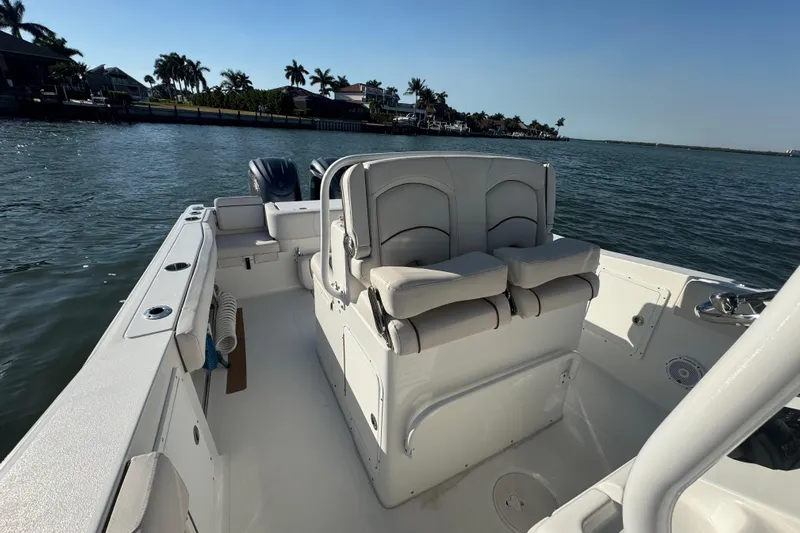  Yacht Photos Pics 2021 Sea Hunt Gamefish 30 boat with forward seating on calm water.