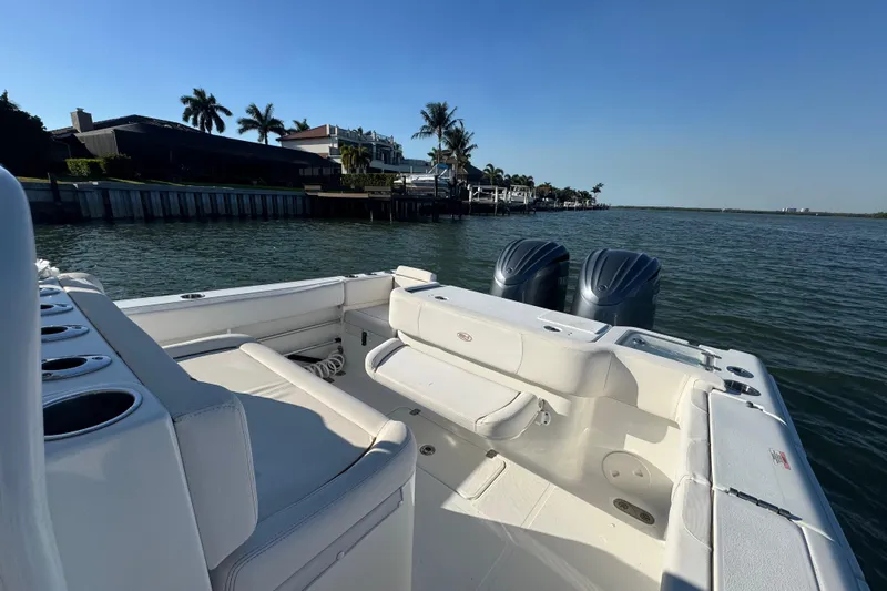  Yacht Photos Pics 2021 Sea Hunt Gamefish 30 boat with forward seating on calm water.
