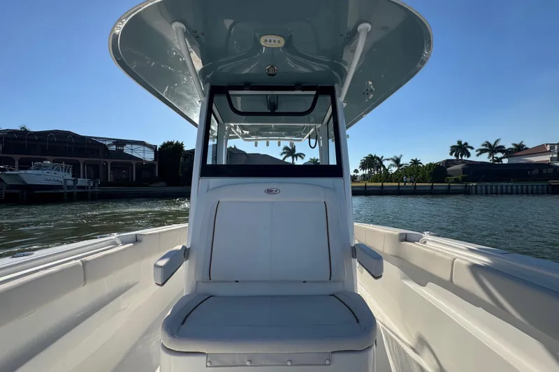  Yacht Photos Pics 2021 Sea Hunt Gamefish 30 Forward Seating boat on calm water, sunny day.