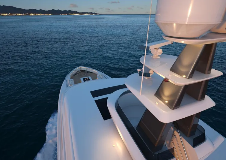 Magnolia Yacht Photos Pics Luxurious 2026 Magnolia Yachts vessel cruising on serene waters at dusk.