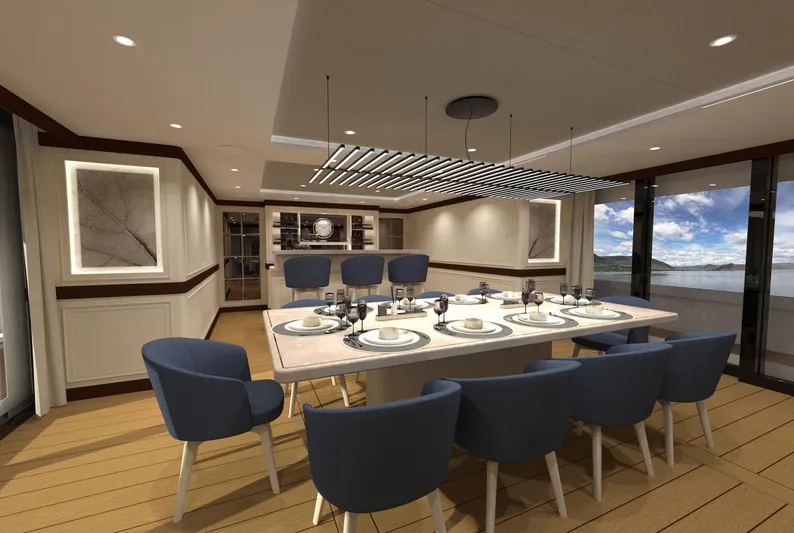 Magnolia Yacht Photos Pics Luxurious dining area on 2026 Magnolia Yachts, featuring elegant table setting and modern decor.