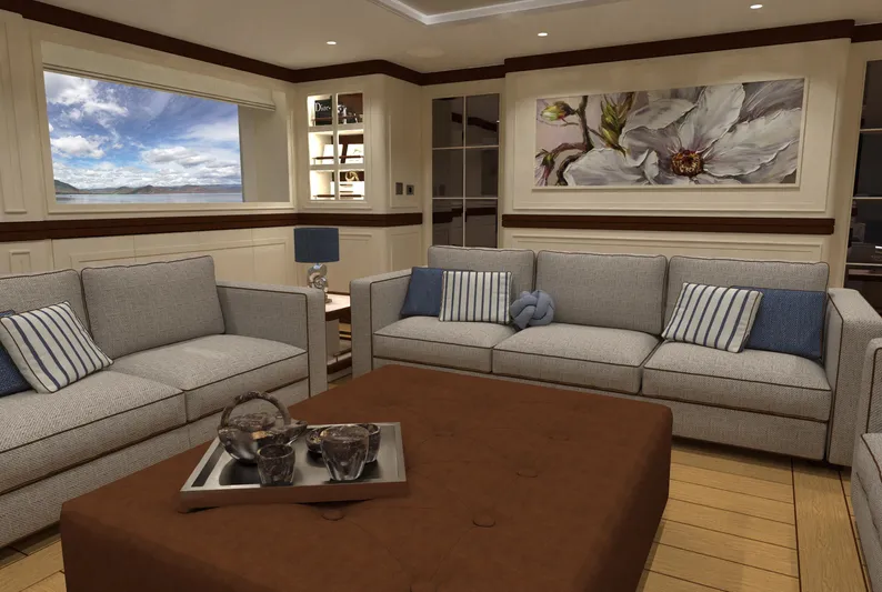 Magnolia Yacht Photos Pics Luxurious yacht interior with elegant sofas, large window, and floral artwork, Magnolia Yachts 2026.