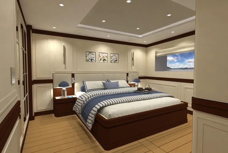 Magnolia Yacht Photos Pics Luxurious 2026 Magnolia Yachts bedroom with elegant decor and ocean view window.