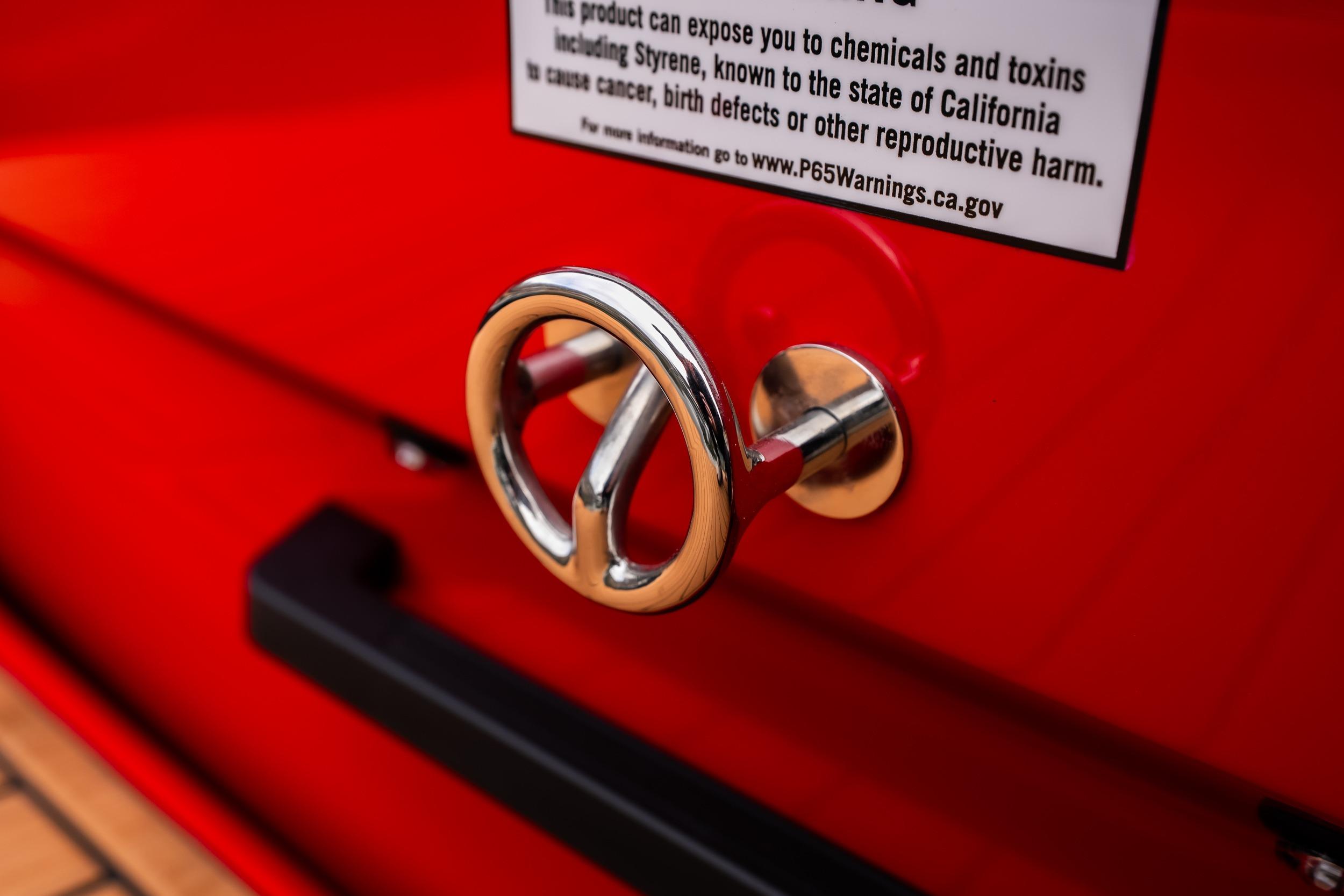 Red MB B52 23 Classic 2026 with chrome detail and warning label.