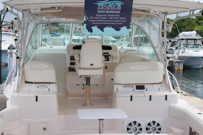  Yacht Photos Pics 2007 Grady-White 360 Express yacht cockpit with helm and seating at marina.