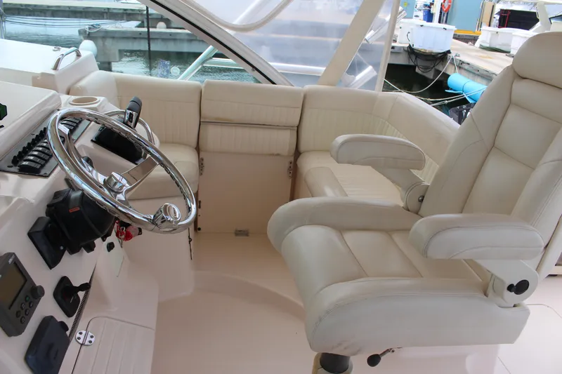  Yacht Photos Pics 2007 Grady-White 360 Express helm with leather seating and modern controls.