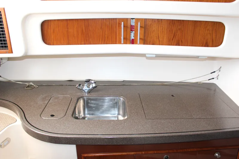  Yacht Photos Pics 2007 Grady-White 360 Express boat galley with sink and countertop.