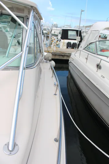  Yacht Photos Pics 2007 Grady-White 360 Express docked beside another boat.