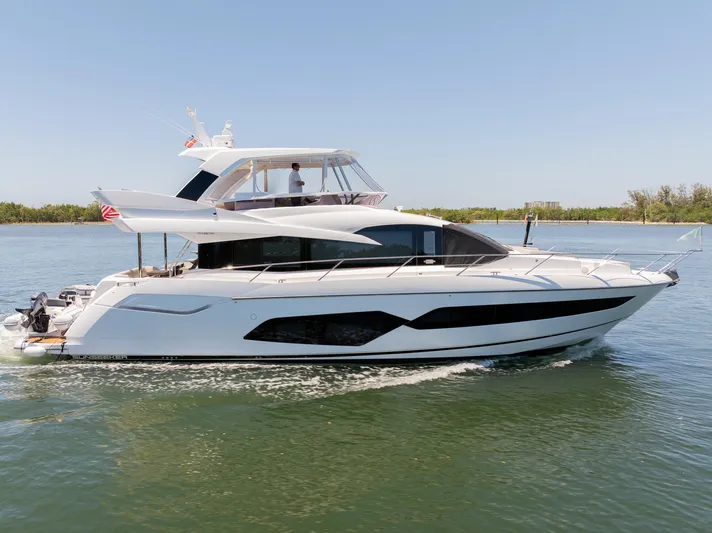 Sea Zar Yacht Photos Pics 2019 Sunseeker Manhattan 66 yacht cruising on a sunny day.