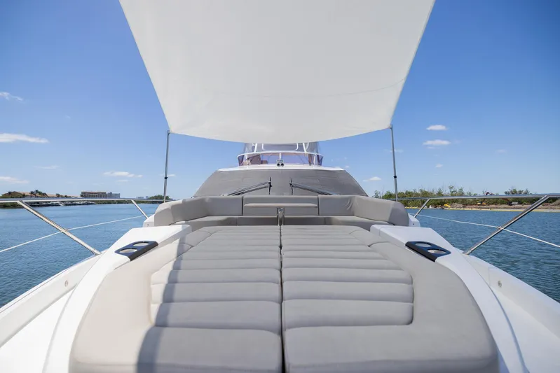 Sea Zar Yacht Photos Pics 2019 Sunseeker Manhattan 66 yacht with sunshade and cushioned deck.
