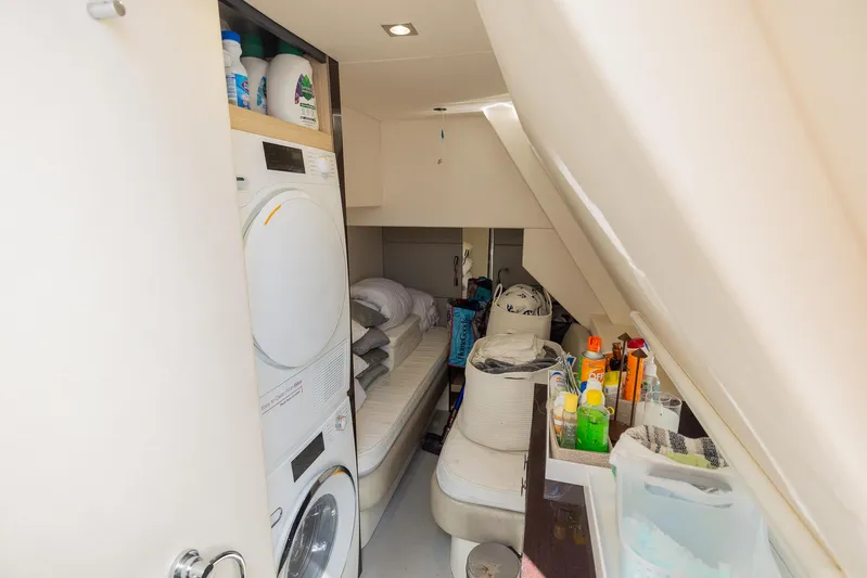 Sea Zar Yacht Photos Pics Laundry and storage area inside a 2019 Sunseeker Manhattan 66 yacht.