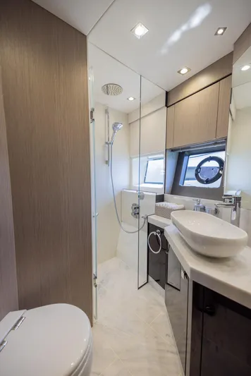 Sea Zar Yacht Photos Pics Luxurious bathroom in 2019 Sunseeker Manhattan 66 yacht with modern fixtures.