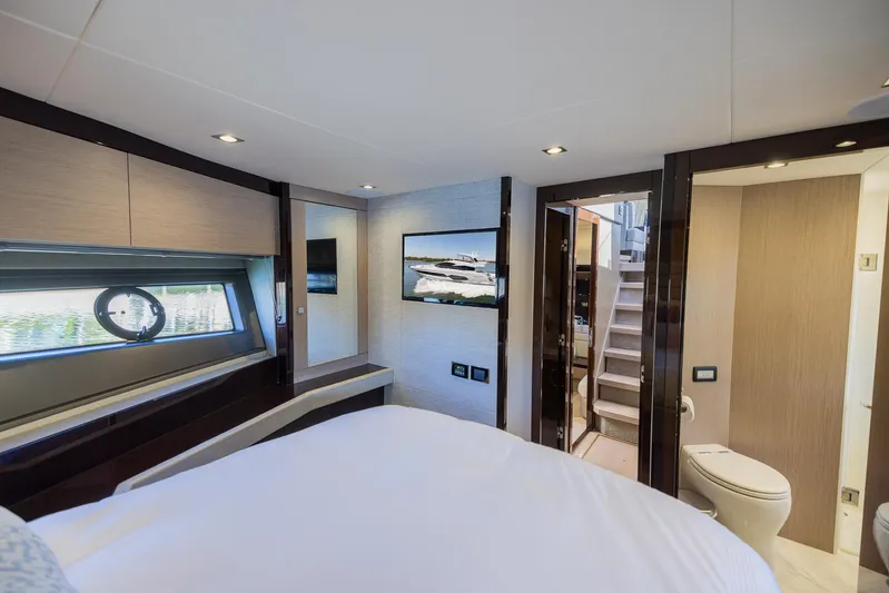 Sea Zar Yacht Photos Pics Luxurious bedroom interior of 2019 Sunseeker Manhattan 66 yacht with modern amenities.