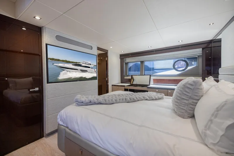 Sea Zar Yacht Photos Pics Luxurious bedroom interior of 2019 Sunseeker Manhattan 66 yacht with modern decor.