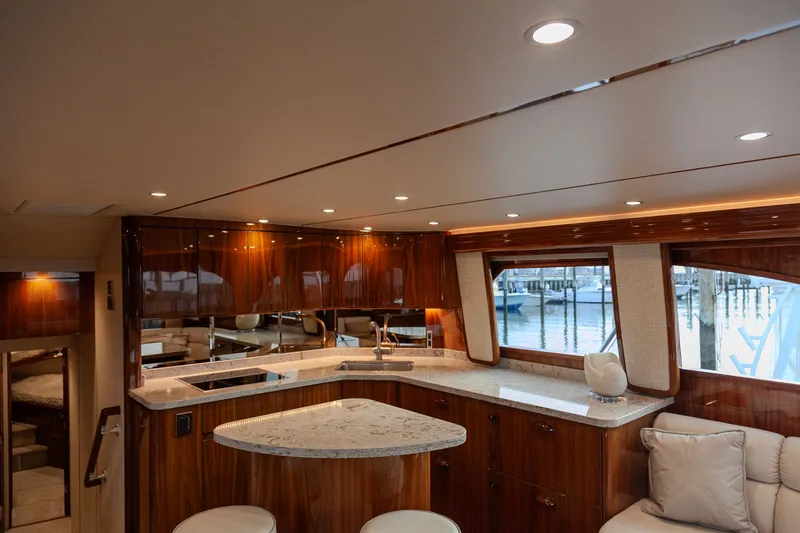  Yacht Photos Pics Luxurious kitchen on a 2019 Viking 52 Convertible yacht.