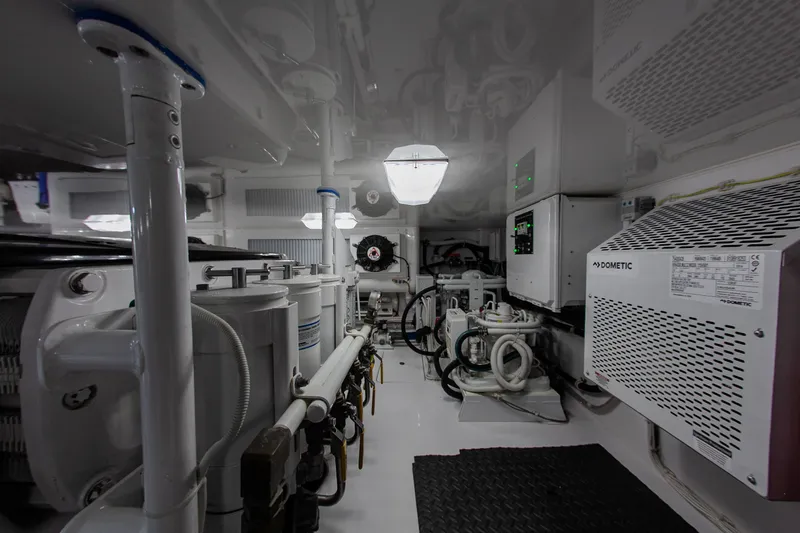  Yacht Photos Pics Engine room of 2019 Viking 52 Convertible with technical equipment.