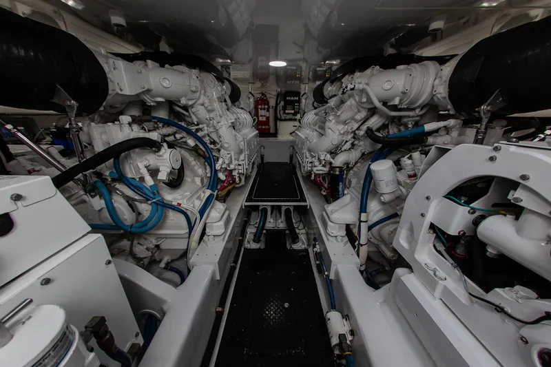  Yacht Photos Pics Engine room of 2019 Viking 52 Convertible with powerful machinery.
