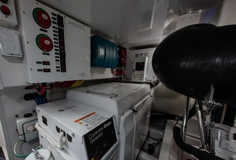  Yacht Photos Pics Engine room of 2019 Viking 52 Convertible with Cummins Onan generator.
