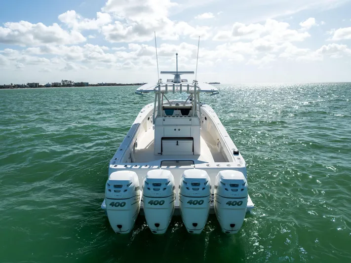 Yacht Photos Pics 2022 SeaVee 390Z boat with four 400 horsepower engines on open water.