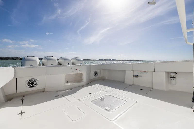  Yacht Photos Pics SeaVee 390Z 2022 boat deck with ocean view and clear sky.