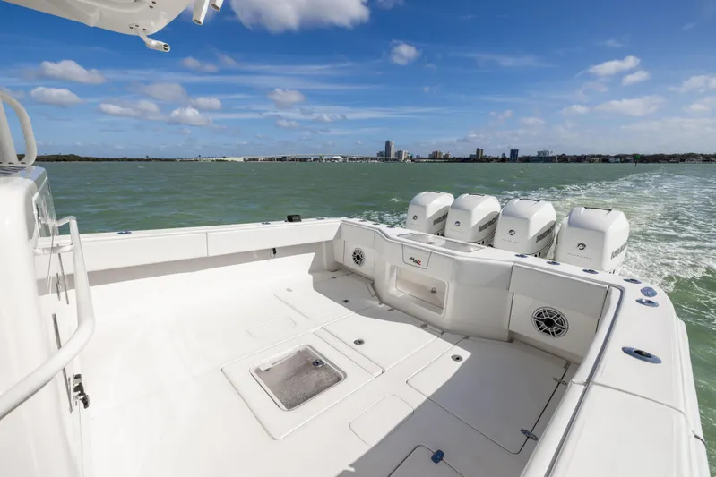  Yacht Photos Pics 2022 SeaVee 390Z boat with quad engines cruising on open water.