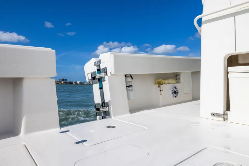  Yacht Photos Pics 2022 SeaVee 390Z boat deck with ocean view and blue sky.