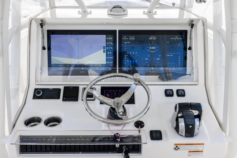  Yacht Photos Pics 2022 SeaVee 390Z helm with dual displays and modern controls.