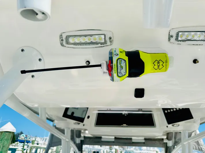  Yacht Photos Pics 2019 Sea Fox 328 Commander boat interior with mounted emergency radio and LED lights.