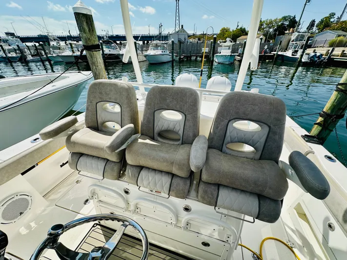  Yacht Photos Pics 2019 Sea Fox 328 Commander boat seats at marina dock.