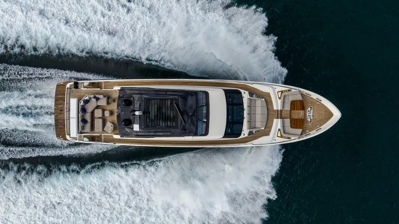 Aurora Yacht Photos Pics Aerial view of 2022 Ferretti Yachts 1000 cruising on the ocean.
