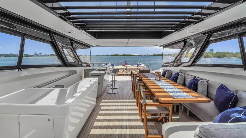 Aurora Yacht Photos Pics Luxurious 2022 Ferretti Yachts 1000 interior with elegant seating and ocean view.