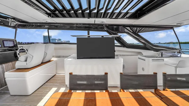 Aurora Yacht Photos Pics Luxurious 2022 Ferretti Yachts 1000 interior with modern seating and panoramic views.