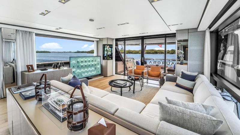 Aurora Yacht Photos Pics Luxurious interior of 2022 Ferretti Yachts 1000 with elegant seating and scenic views.